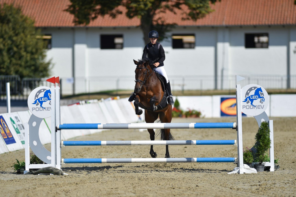 
				Ajda Golob je z Enoro osvojila zlato med otroki.			