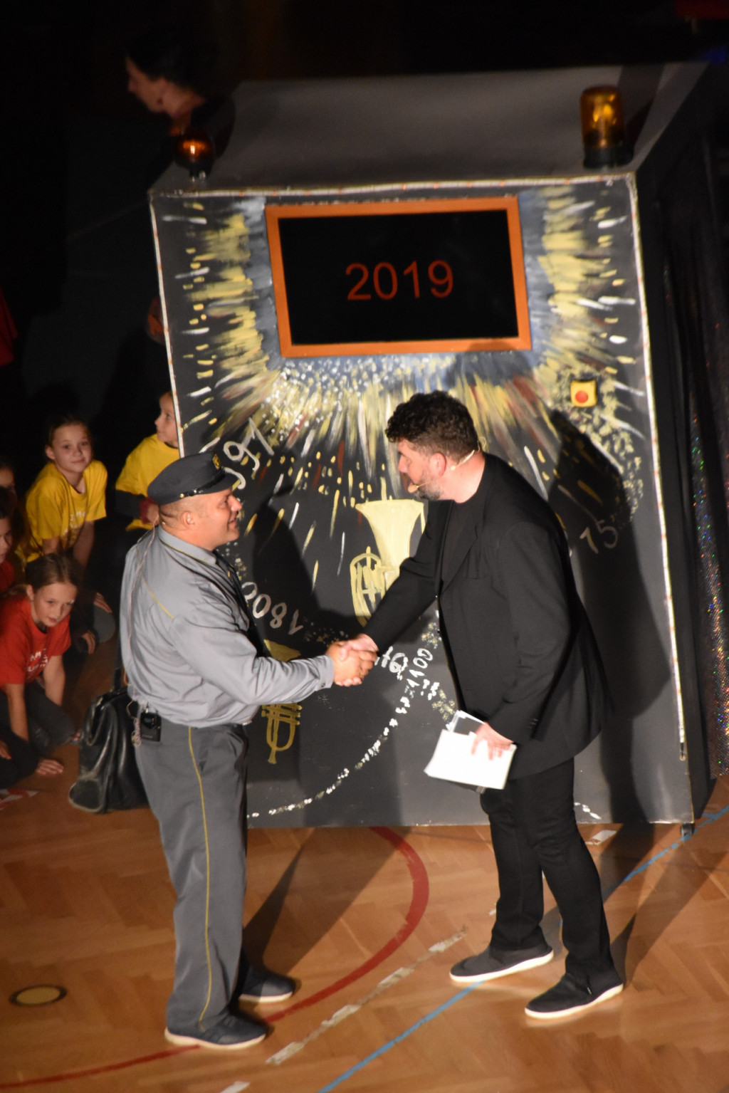 
				Slikopleskarska spremljava godbenikov			